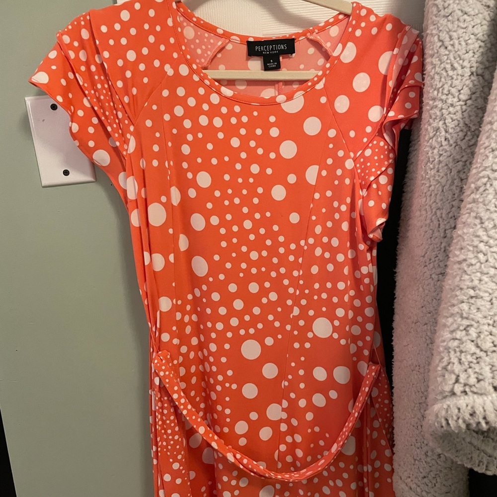 Orange and white polka dot dress